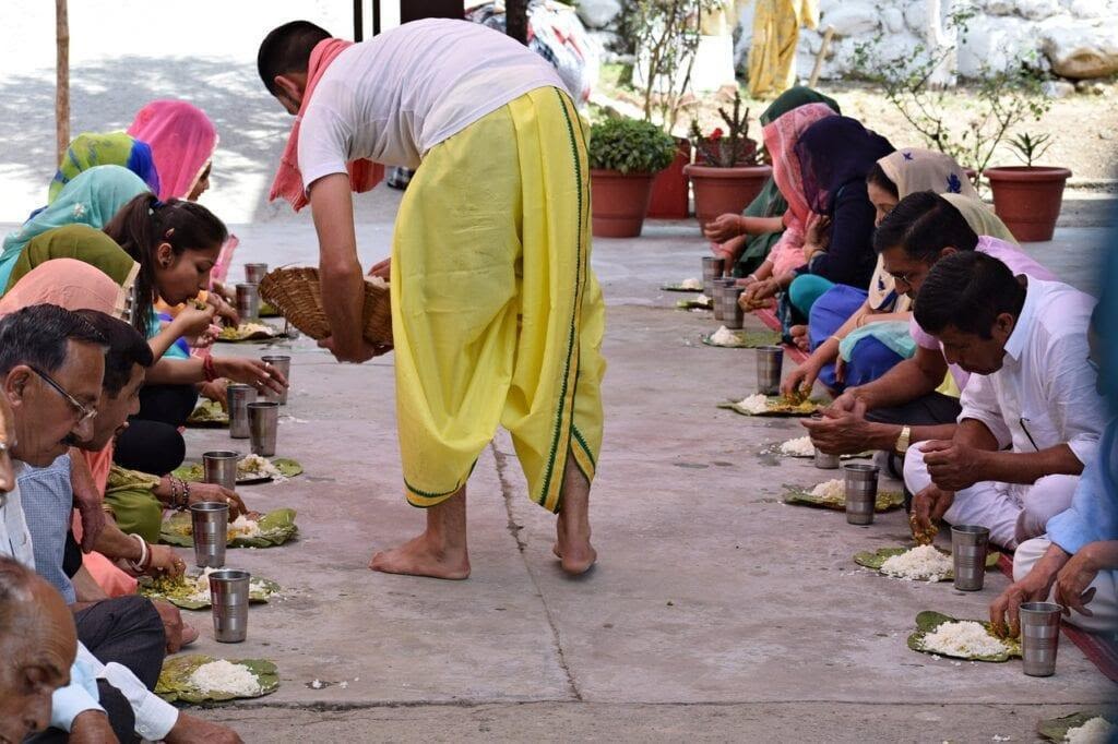 Indian people having food together