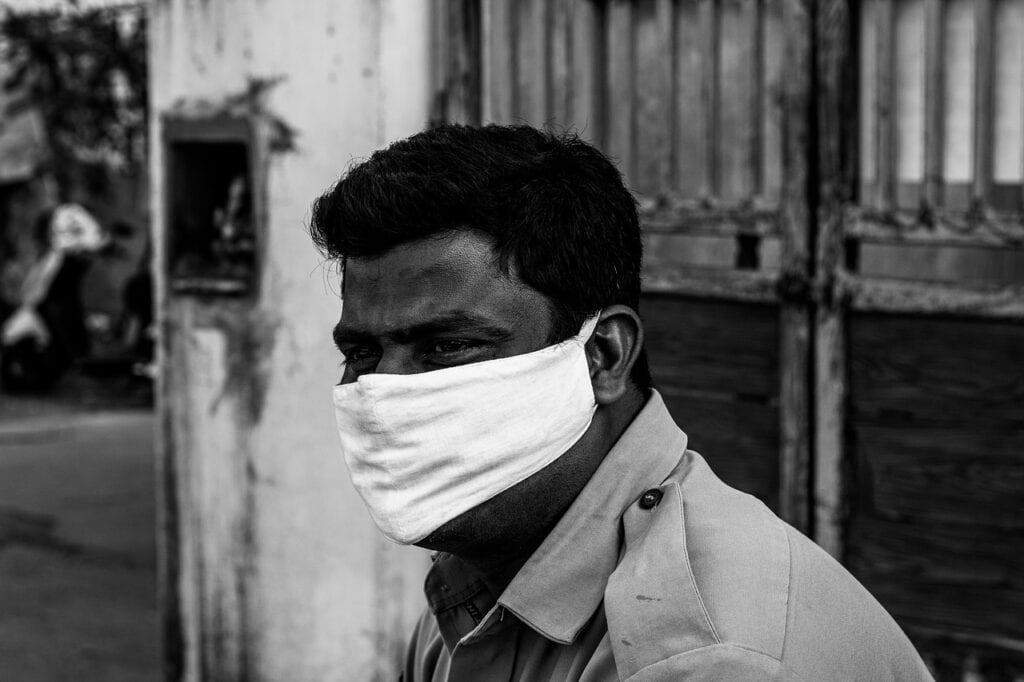 Man from India wearing a facemask