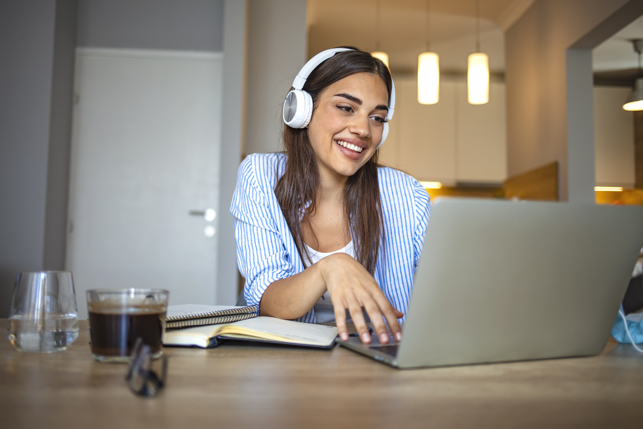 girl transcribing audio files